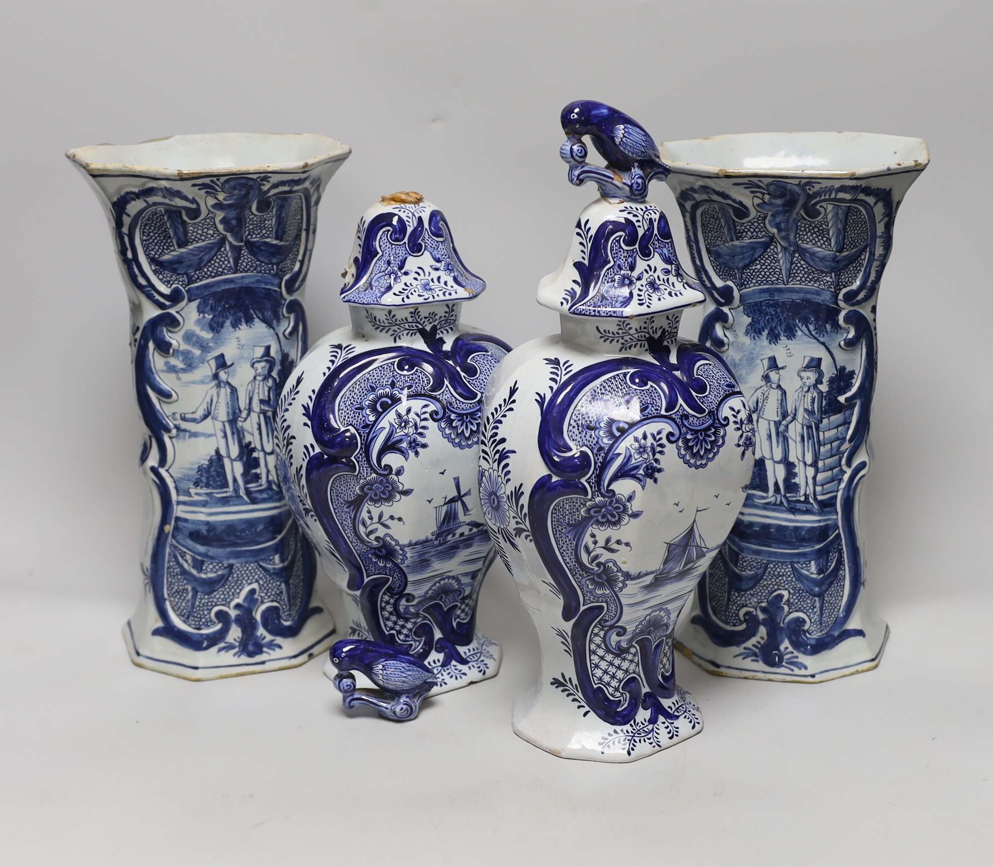 Two pairs of Delft vases, the tall hexagonal vases, 18th century, tallest 30cm
